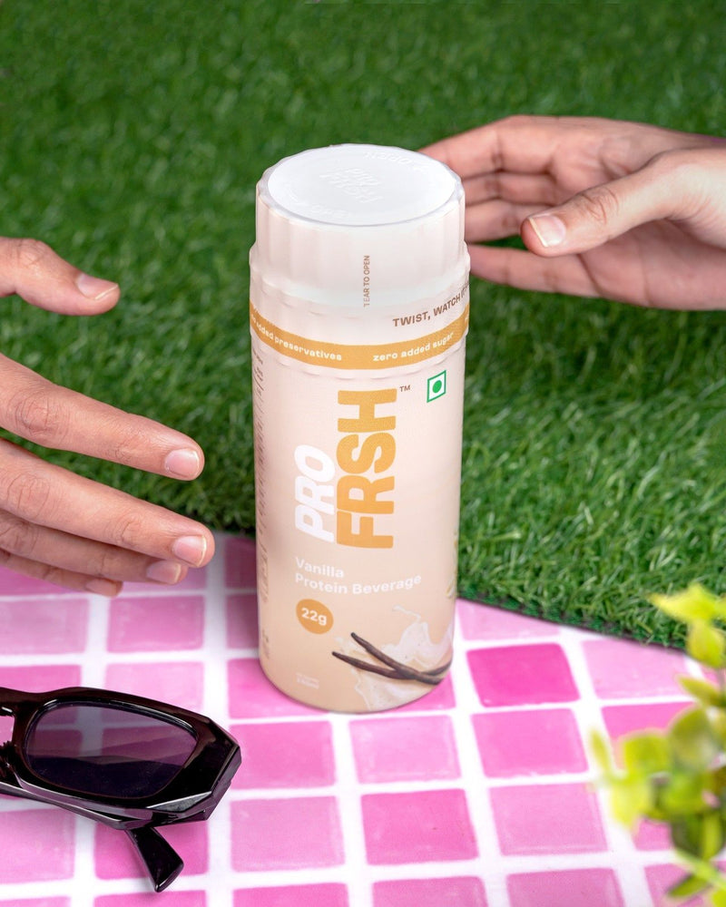 Twisting the Pro Frsh cap to release the protein into the bottle