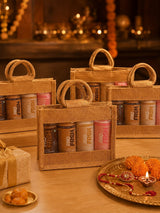 Several Pro Frsh Rakhi gift hampers arranged on a festive table